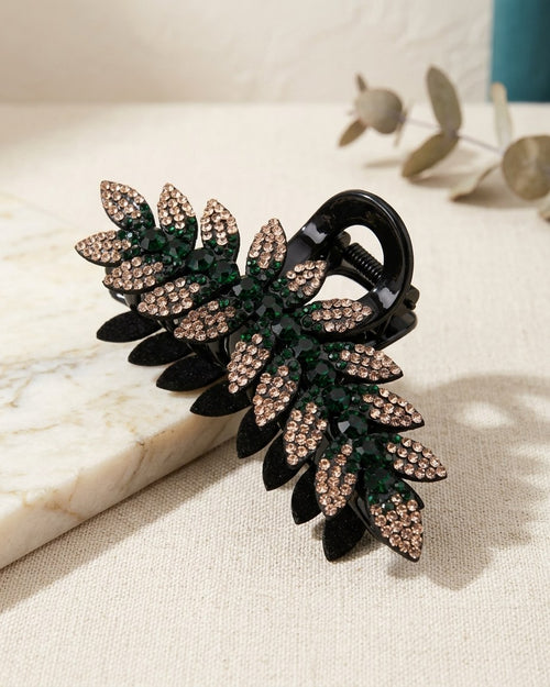 Rhinestone flower claw clip on a cream linen table
